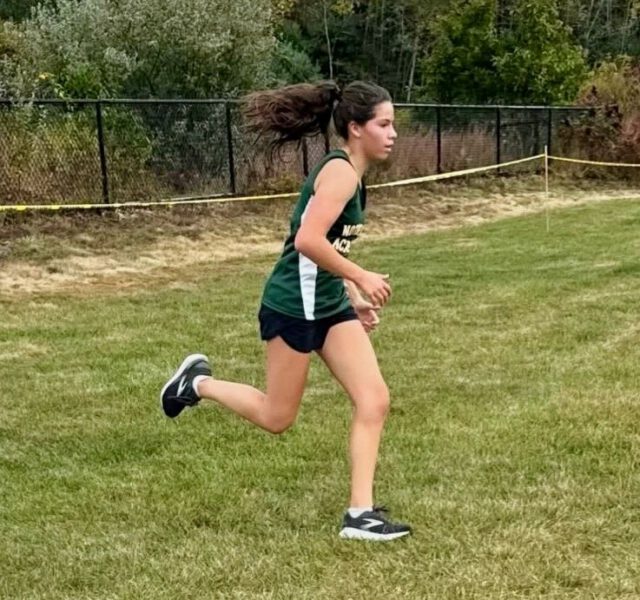Eighth-grader Longton runs away from the crowd