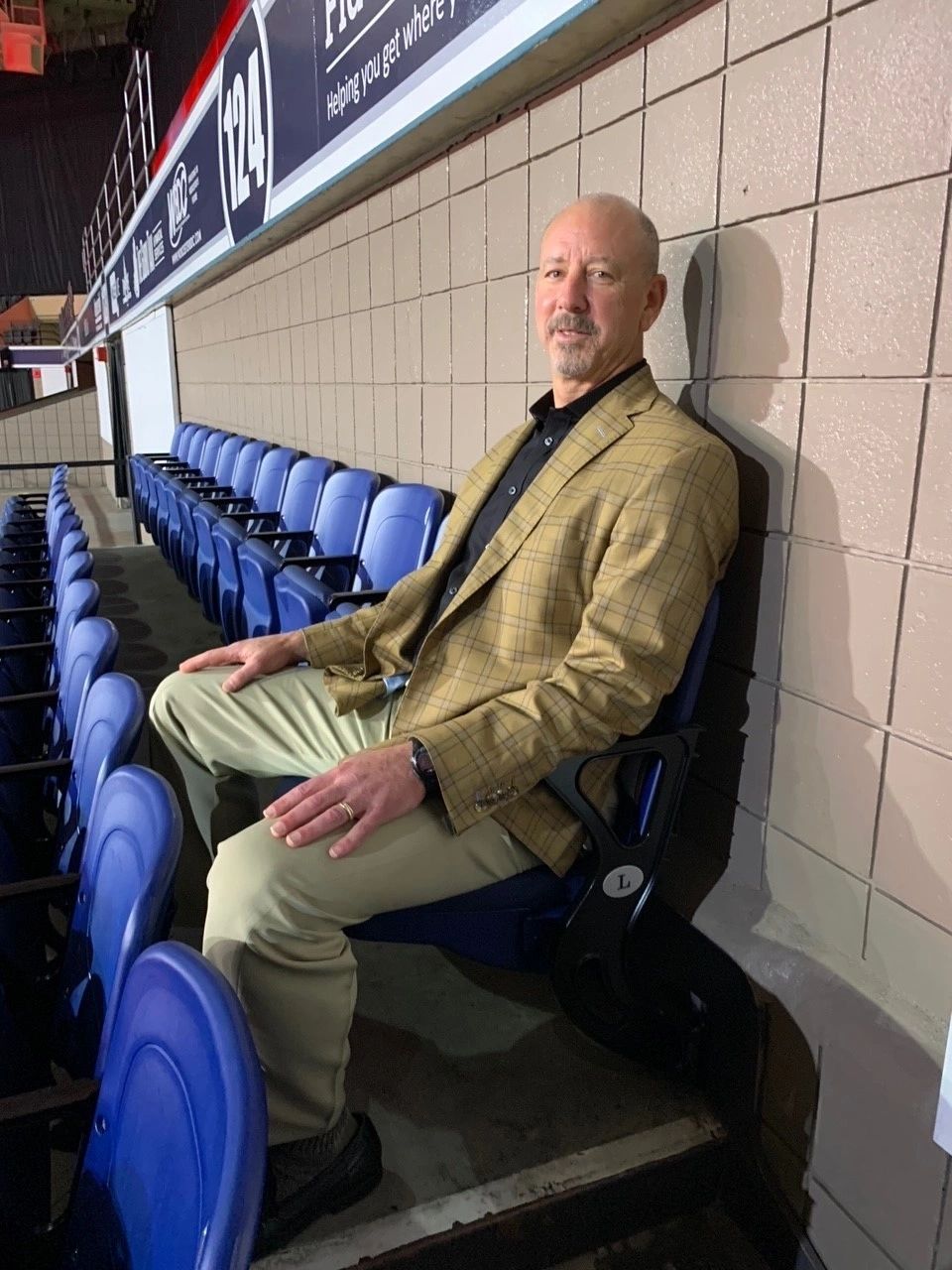 Railers owner Cliff Rucker tests out a new seat