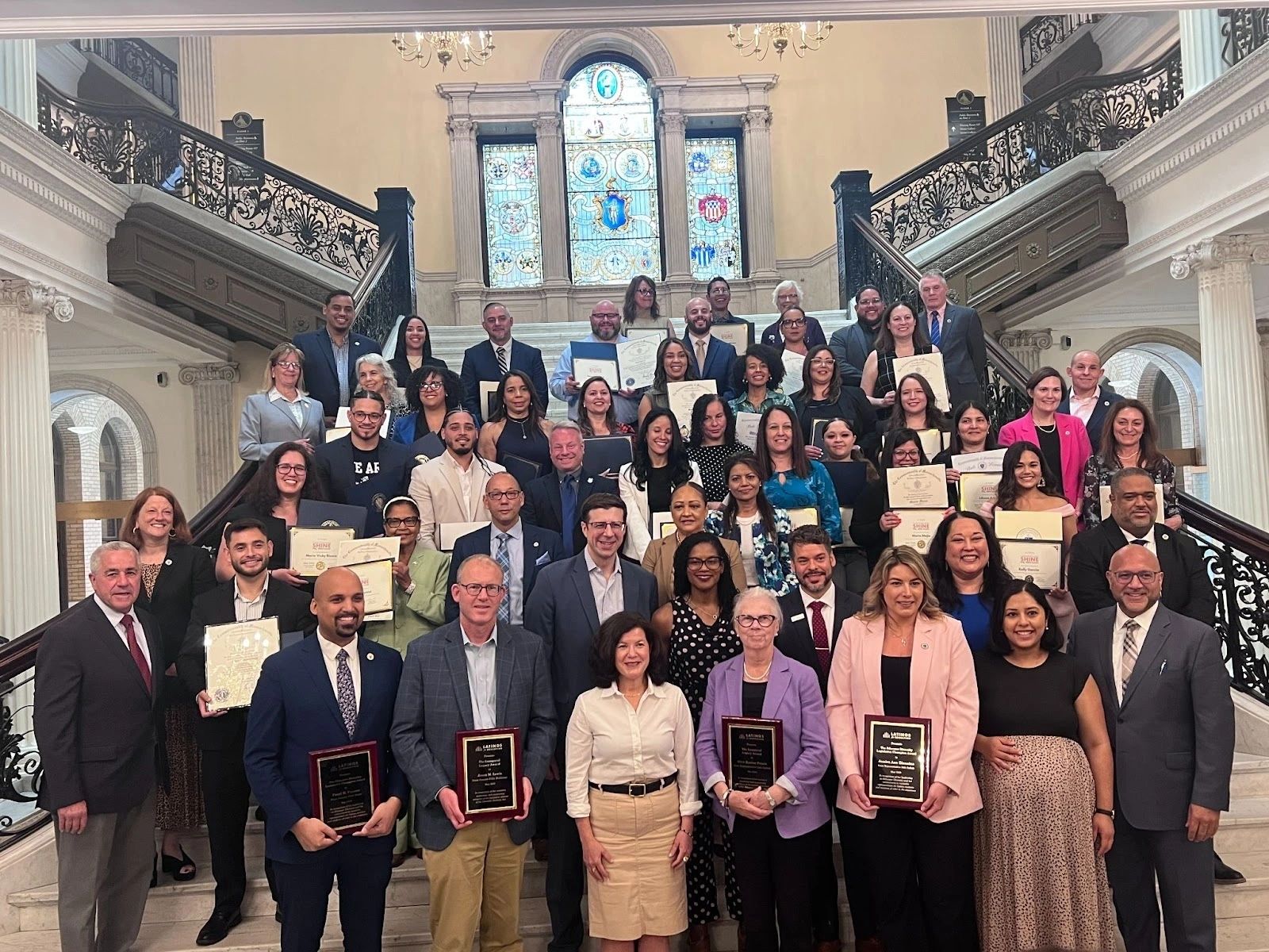 Honored teachers and legislators join Latinos for Education staff at the Massachusetts State House Grand Staircase (photo submitted)