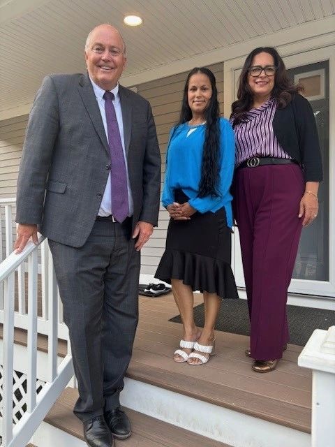 Unibank CEO Michael Welch, new homeowner Mary Luz Amadeo and Tania Medina, AVP of UniBank  (photo submitted)