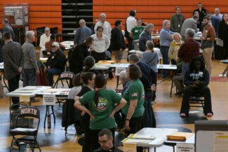 More than 100 city employees gathered for the recount (photo by Sam Bishop)