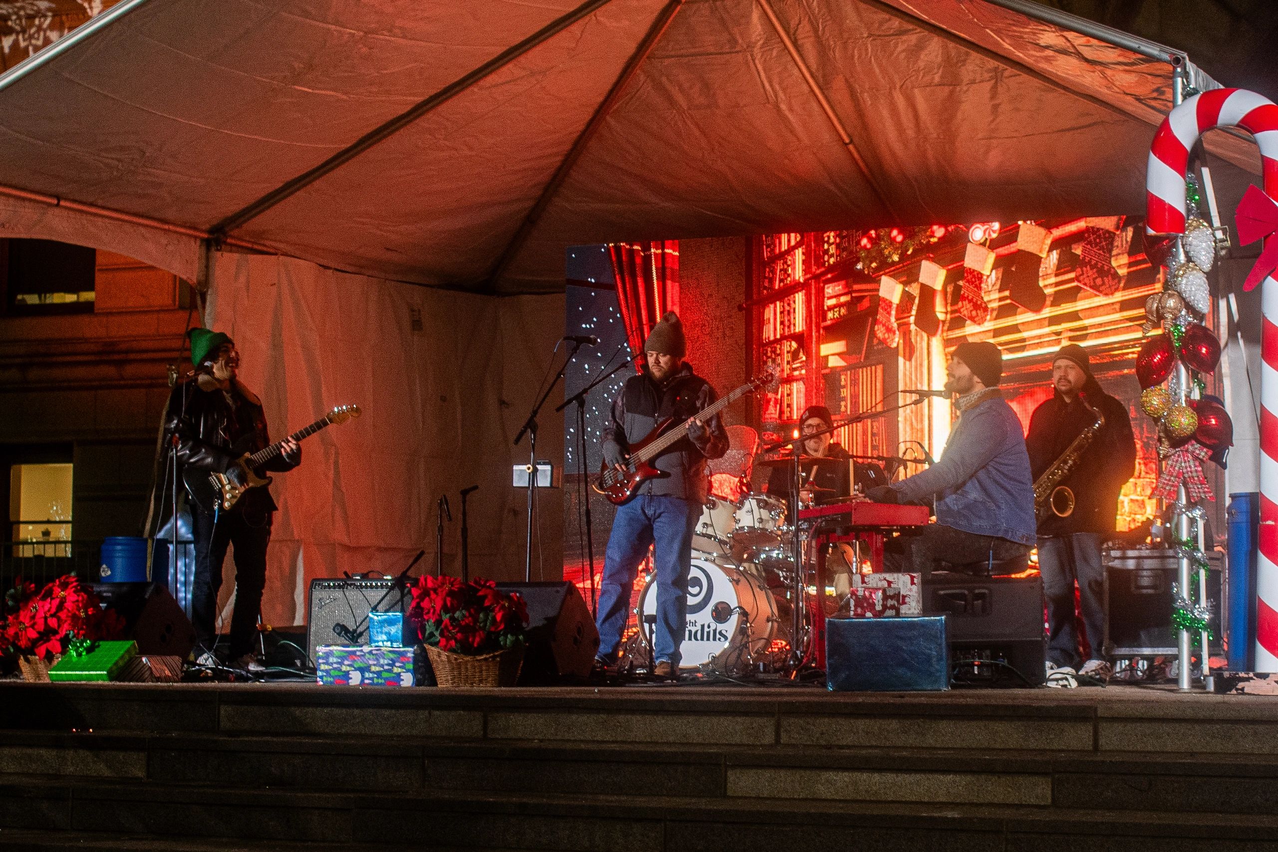 Ricky Duran, of NBC's "The Voice" fame, performed with his band, the Blue Light Bandits. And this is what it looks like when musicians have to play in the freezing cold! (photo by Steve Smith)