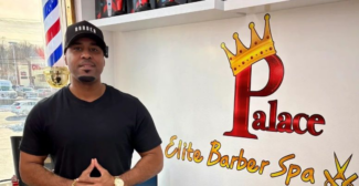 Principe “Prince” Virtuez cuts hair but not corners in helping others (photo by Bill Doyle)