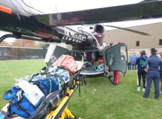 A UMass Life Flight helicopter lands on Assumption University’s campus during a Tactical Combat Casualty Care training exercise for physician assistant students (photo credit: Assumption University)