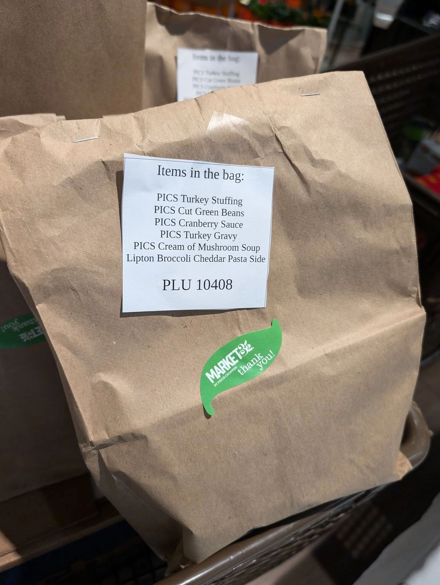 Thanksgiving meal bags distributed by Friendly House last year. The nonprofit is supplying even more this year.