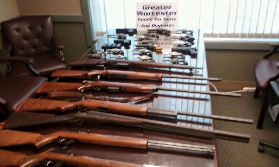 Some of the guns dropped off at a gun buyback program held several years ago in Worcester (photo credit: Worcester County DA's Office)