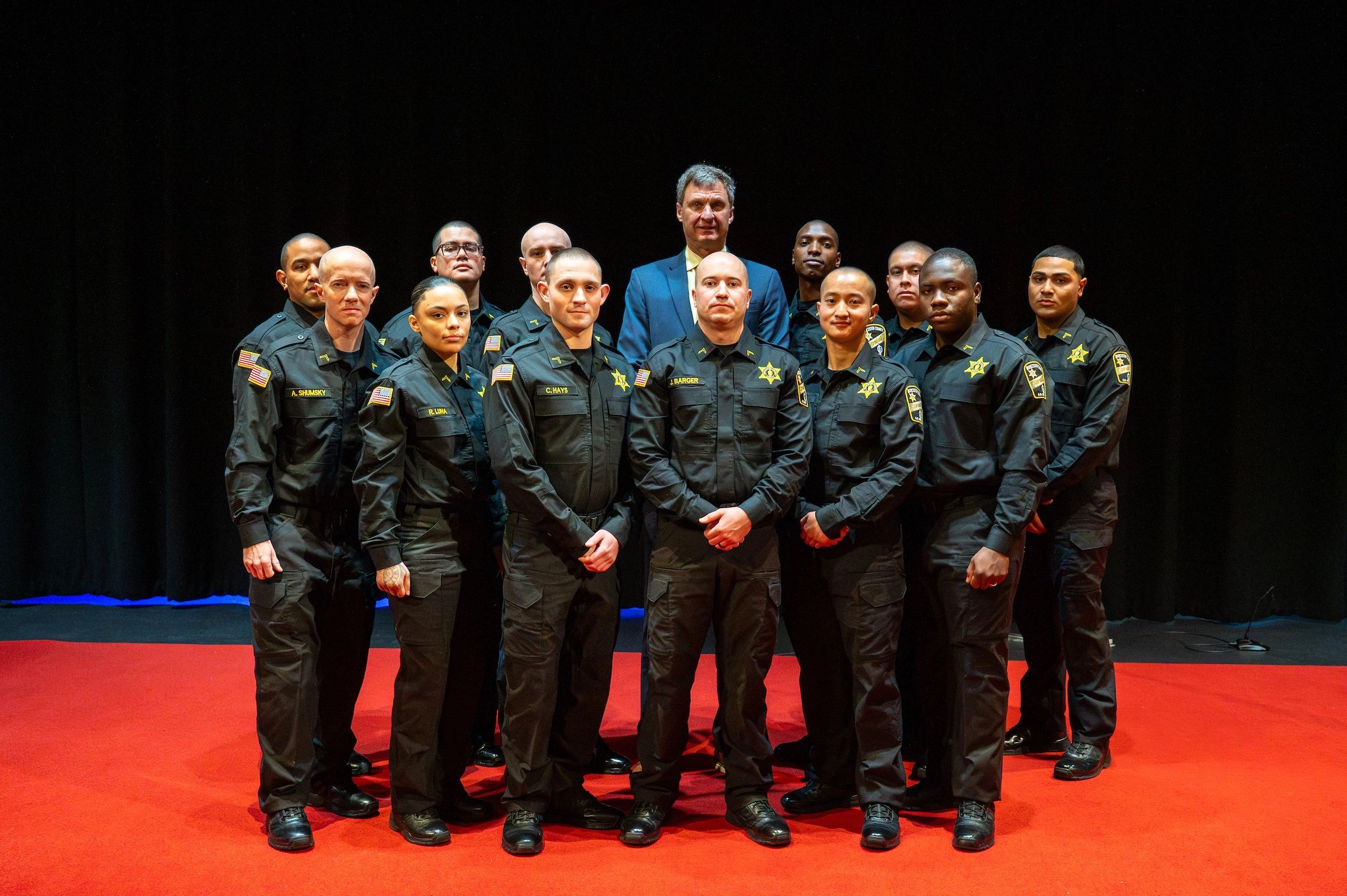 : Sheriff Evangelidis poses for a photo with the 12 graduates of the WCSO B.R.T.A. #64 (photo credit: WCSO)