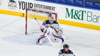 Henrik Tikkanen with defenseman Matt Stief (photo courtesy the Railers)