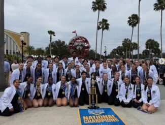 The Burncoat High School Spirit Team poses with their trophy after a big win in Florida (photo by Burncoat High School Spirit Team)