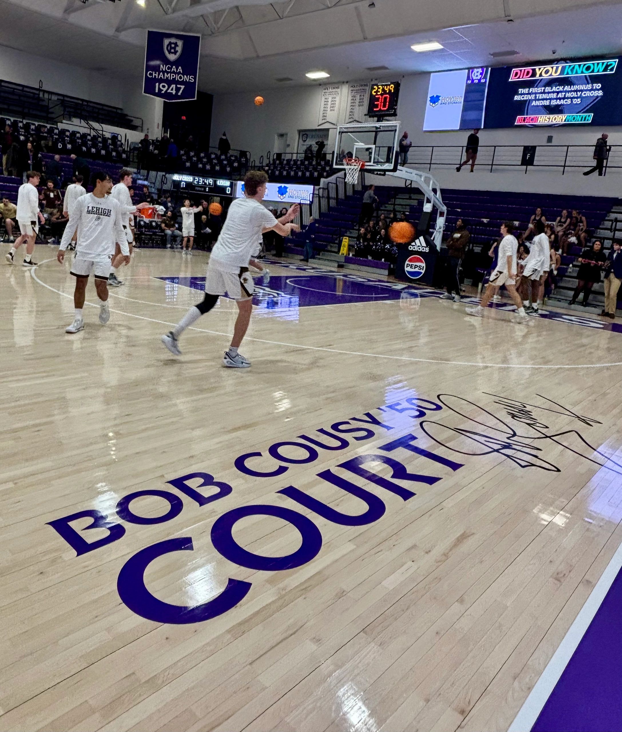 The basketball court at the Hart Center was dedicated as the “Bob Cousy ‘50 Court” with his signature on Saturday (photo by Bill Doyle)