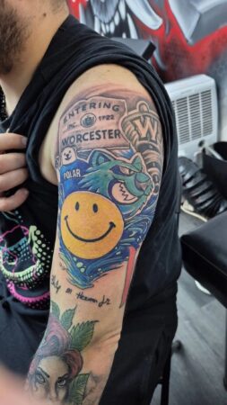Derek Herman’s Worcester-themed tattoo sleeve features a collection of local symbols