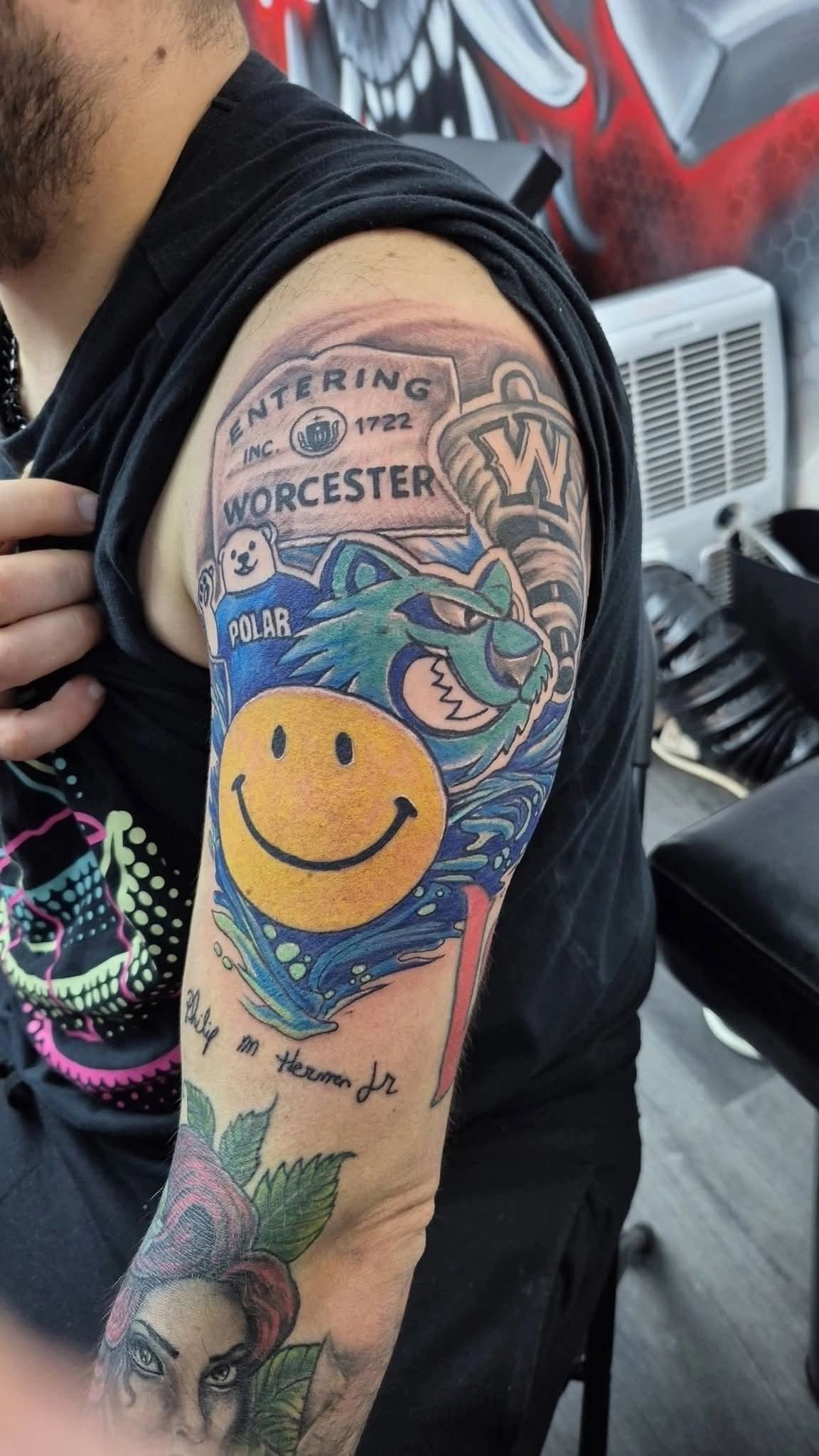 Derek Herman’s Worcester-themed tattoo sleeve features a collection of local symbols