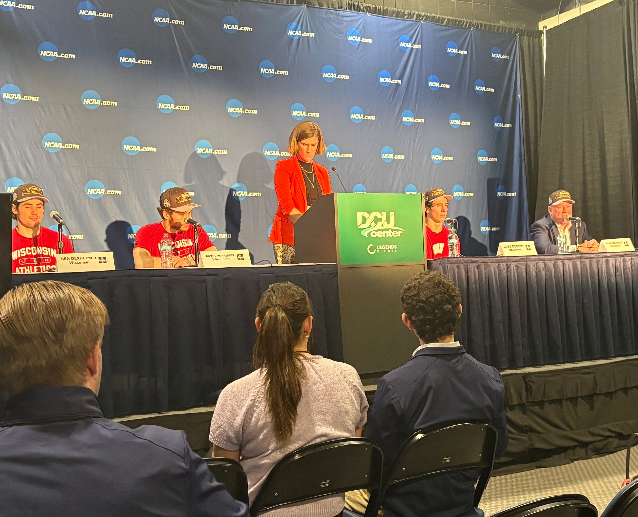 Wisconsin players (L to R): Ben Dexheimer, Gavin Morrissey and Luke Osburn field questions with head coach Mike Hastings (far right) in the postgame press conference (photo by Mike Vigneux)