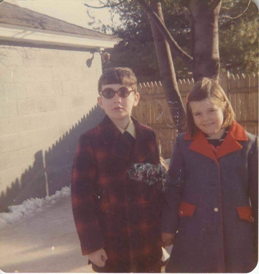 Richard Moore and Mary Herlihy in front of the backyard skating rink (photo submitted)