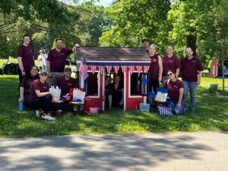 Building more than playhouses: local bank marks 9th year supporting Habitat for Humanity event for veteran families